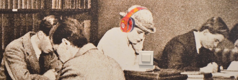 Mural in Senate House study space. The mural shows students from days gone by reading books and studying intently. It is presented in sepia-scale colours, all except for a set of modern headphones being worn by one student, which are bright orange. 
